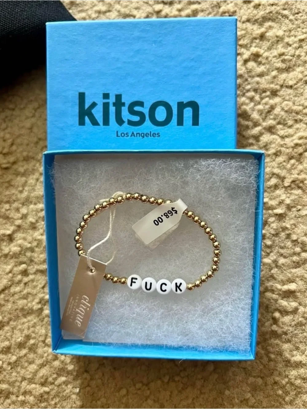 Kitson pouch and bead bracelet